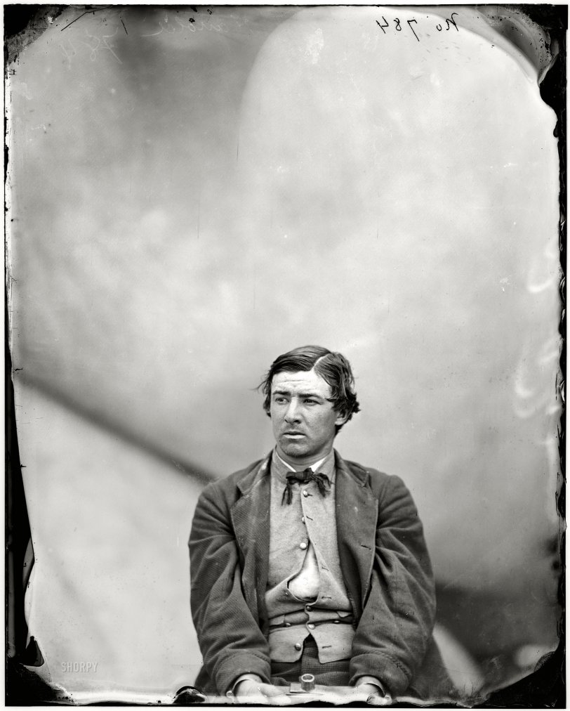 April 1865. "Washington Navy Yard, David E. Herold, Lincoln assassination conspirator." This 22-year-old accomplice of John Wilkes Booth was executed by hanging on July 7, 1865. Glass negative by Alexander Gardner. View full size.
