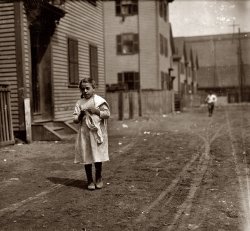 August 1912. Tenement home work (piecework for garment makers). "Annie Fedele, 22 Horace Street, Somerville, Massachusetts. This is one of the places she works on crochet." View full size. Photo and caption by Lewis Wickes Hine.
22 Horace StreetThe online database for Somerville's assessors includes a current photo of 22 Horace Street, as well as other buildings in that city.  
The Assessors' database says the 2-family house was built in 1900, so it's probably the same building, although I can't seem to match them up.  Take a look yourself by following this link -- http://data.visionappraisal.com/somervillema/search.asp
[That's interesting. Hine's caption is saying Annie lived at 22 Horace Street, not that this is necessarily the house at that address. - Dave]
PieceworkWhat kind of quality work could a young child like this do?  Was it only the poorest of the poor whose children had to work? Most people who knew about these times are long gone now.
[These were mostly families that had recently immigrated from Russia, Ireland, Italy and Eastern Europe. - Dave]
(The Gallery, Kids, Lewis Hine)