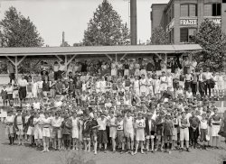 Washington, D.C., 1914. "Boy Scouts -- field sports." In the background: The Frazee-Potomac laundry. Harris & Ewing glass negative. View full size.