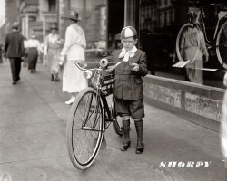 Washington, D.C., 1921. "Times boy and bicycle." Winner of a Mead Ranger bike by virtue of selling 30 newspaper subscriptions. The Ranger contest was a promotion of various papers from about 1917 to 1923. National Photo Co. Collection. View full size.