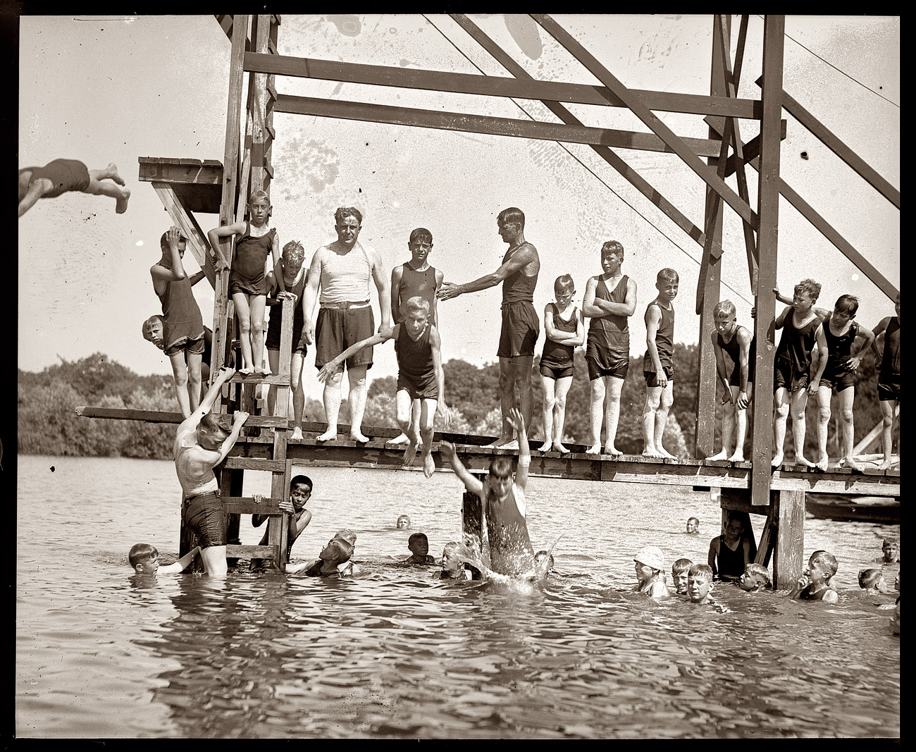 James Davis (white tank top) at Moosehead Lake in Maine in 1921. Davis, a former steelworker, was secretary of labor in the Harding, Coolidge and Hoover administrations and later represented Pennsylvania in the Senate. He also wrote "The Iron Puddler." National Photo Company Collection. View full size.
