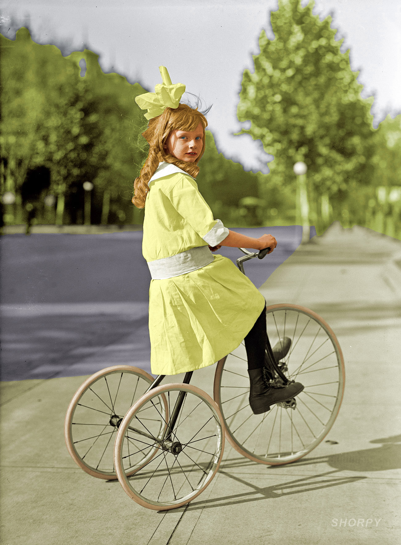 This is a colorized version of Tyke on Trike: 1915. I feel a real connection with this girl. Can you give me her number?  I was thinking that maybe, if she's still single, I might give her a call. View full size.