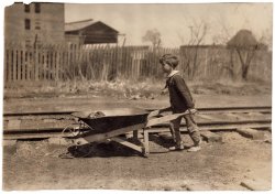 "Swipin’ coal from the freight yards." Oklahoma City, Oklahoma. April 1917. Photograph by Lewis Wickes Hine.  View full size.