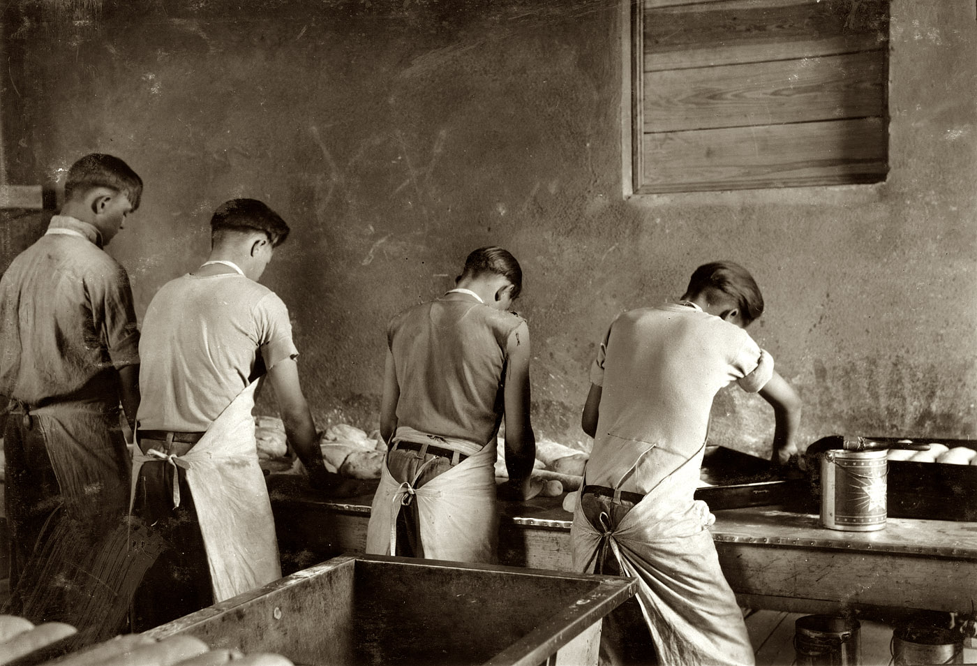 April 1917. "Making bread. Pauls Valley Training School. Pauls Valley, Oklahoma." View full size. Photograph by Lewis Wickes Hine.