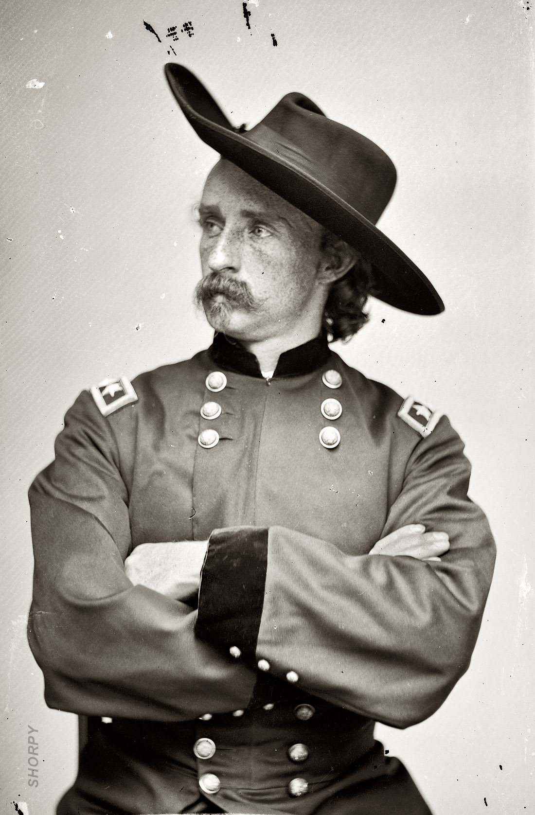 "Major General George Armstrong Custer, officer of the Federal Army" circa 1865. Wet plate glass negative, studio of Mathew Brady. View full size.