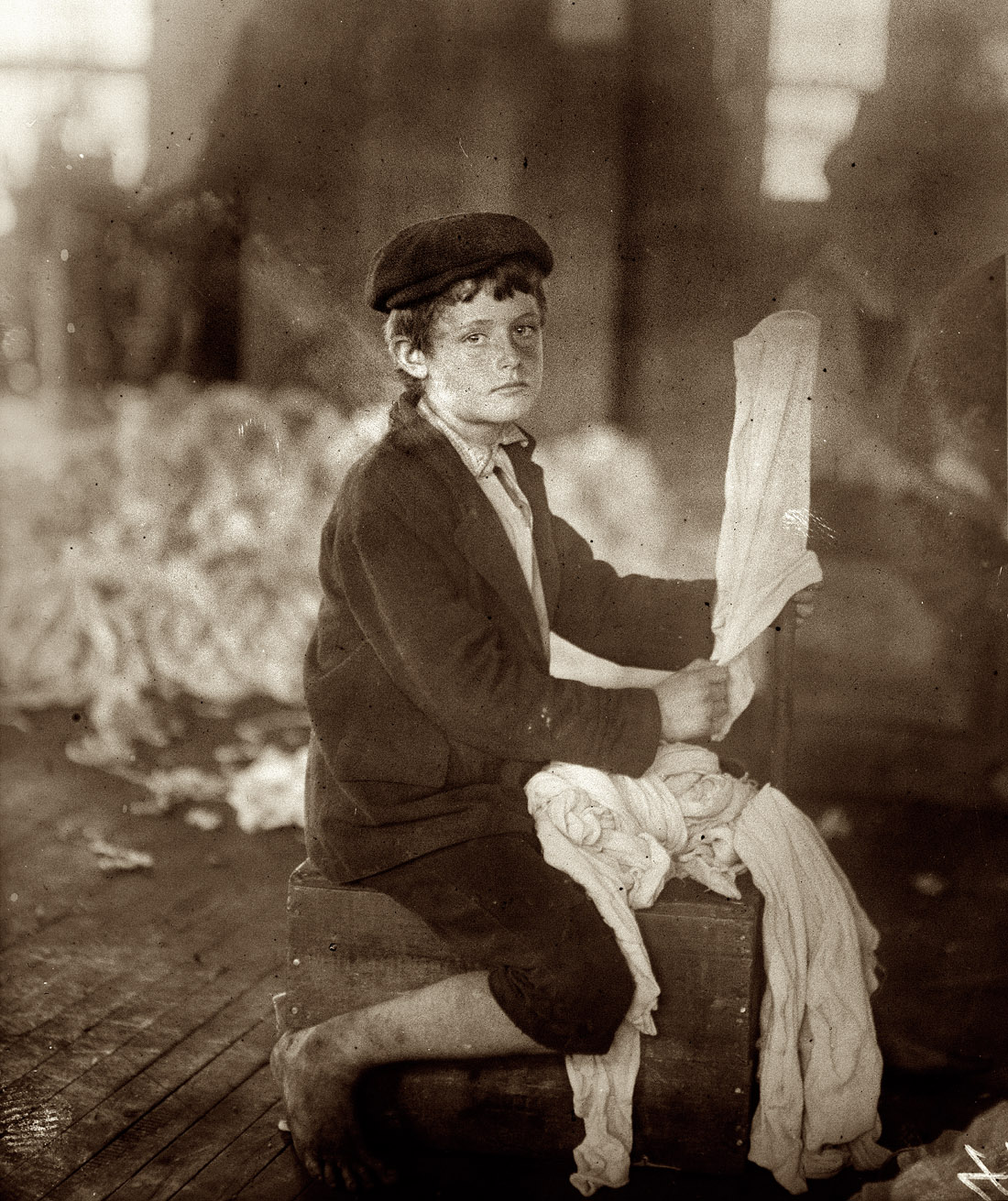 Noon, April 10, 1913. Cherokee Hosiery Mill in Rome, Georgia. "The youngest are turners and loopers. Some of these appear to be as young as 8 and 9 years." Photograph and caption by Lewis Wickes Hine. View full size.
