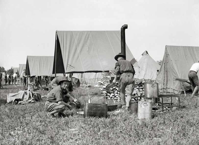 1915. "National Guard of D.C. cooking." Just what is it that makes a fried egg taste so much better out of doors? Harris &amp; Ewing glass negative. View full size.

