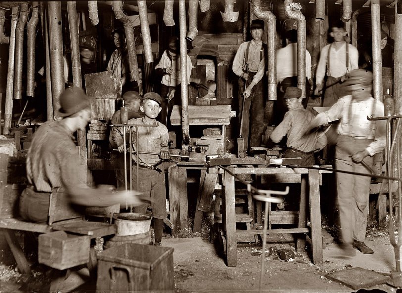 October 1908. "Citizens Glass Co., Evansville, Indiana. Over ten small boys on day shift in one department." View full size. Photograph by Lewis Wickes Hine.