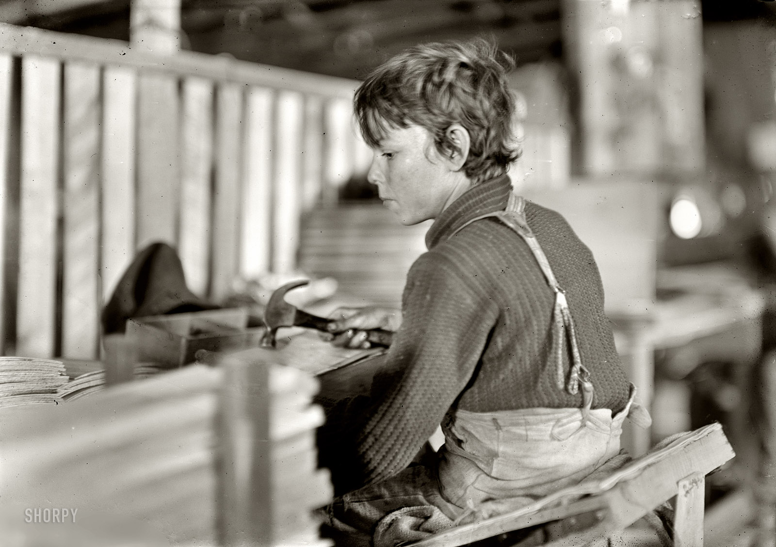 October 1908. Evansville, Indiana. "Boy making melon baskets. A Basket Factory." Photograph by Lewis Wickes Hine. View full size.