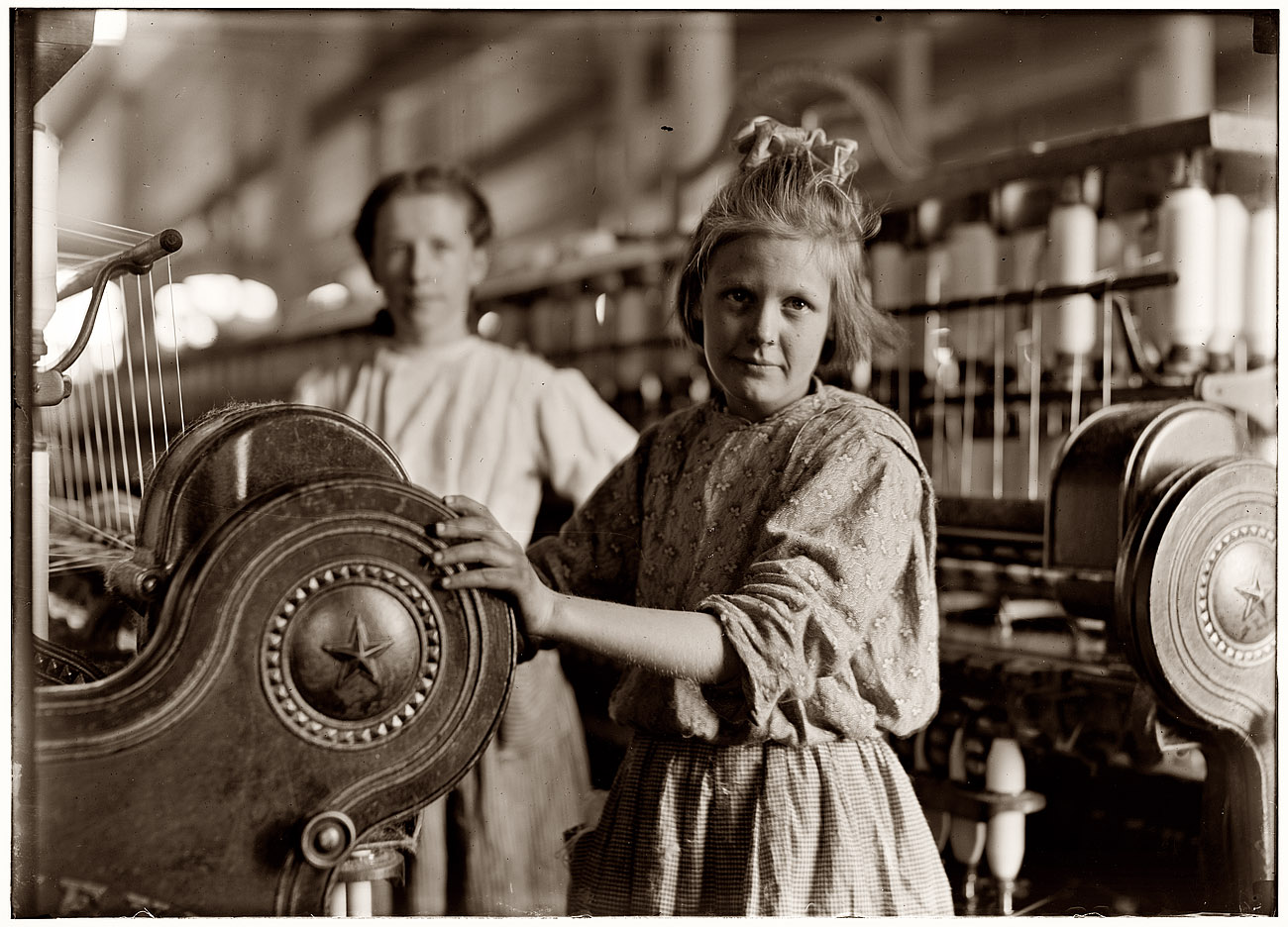 November 1908. "A typical Spinner" at Lancaster Cotton Mills in South Carolina. View full size. Photograph and caption by Lewis Wickes Hine.