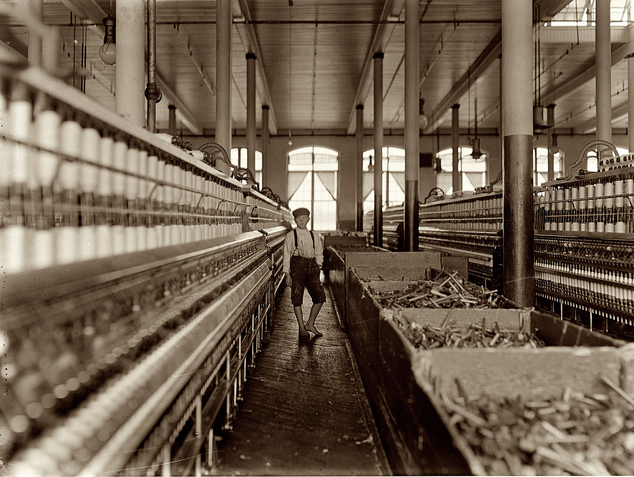 December 1908. Lancaster, South Carolina. "One of the youngsters working in Lancaster Cotton Mills." View full size. Photograph by Lewis Wickes Hine.