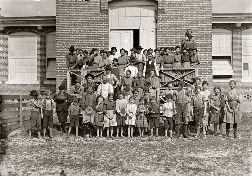 January 1909. Tifton, Georgia. "Workers in the Tifton Cotton Mills. All these children were working or helping, 125 in all. Some of the smallest have been there one year or more." Photo and caption by Lewis Wickes Hine. View full size.
