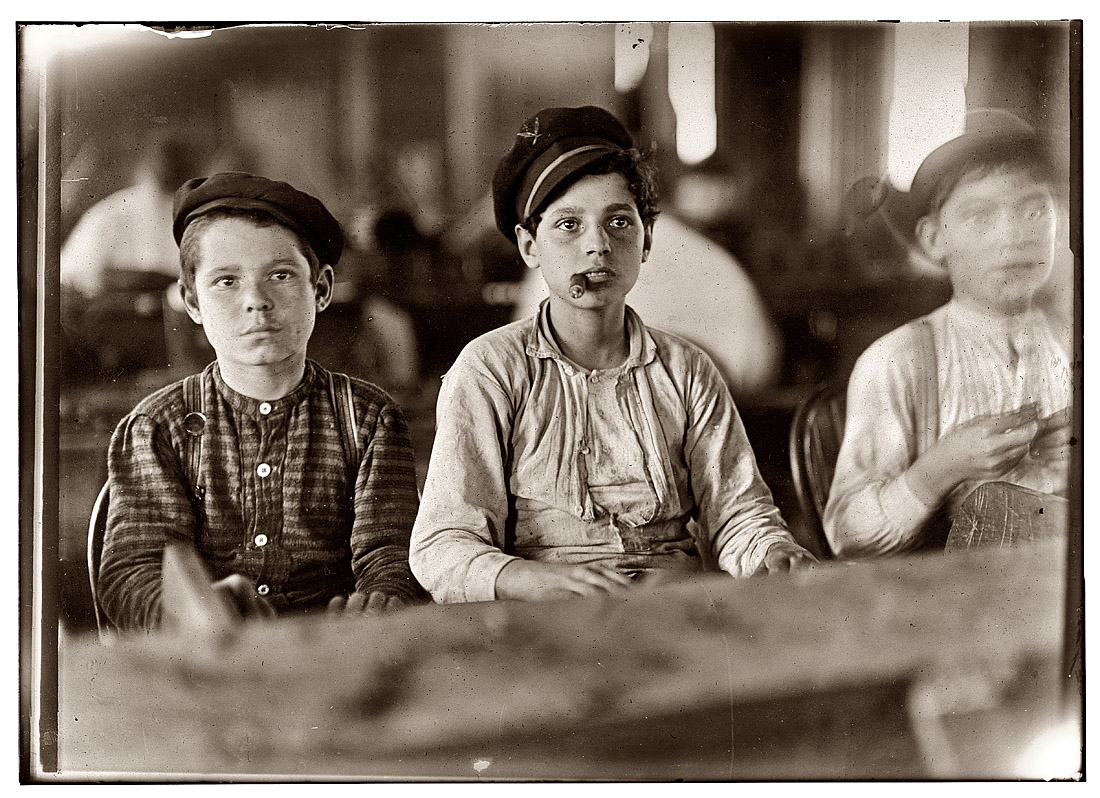 January 1909. "Young cigarmakers in Englehardt & Co., Tampa. Youngsters all smoke." View full size. Photograph by Lewis Wickes Hine.
