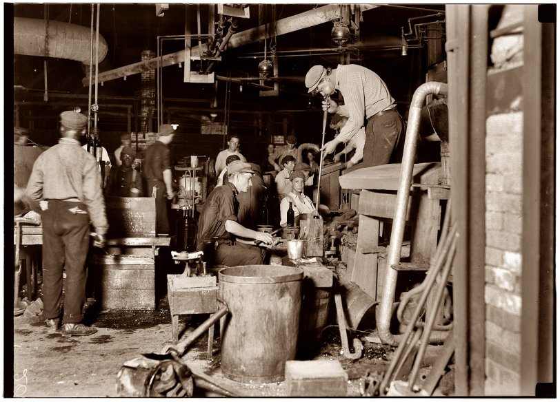 Photo of: Cumberland Glass Works: 1909 -- November 1909. Blowing bottles. Night shift at the Cumberland Glass Works in Bridgeton, New Jersey. View full size. Photograph by Lewis Wickes Hine.