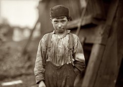 November 1910. Birmingham, Alabama. "John Tidwell, doffer in Avondale Mills." A closeup of the boy seen earlier today, this image was extracted from a scan of the original 5x7 glass negative, as opposed to the print used for the group shot. View full size. From a photograph by Lewis Wickes Hine.