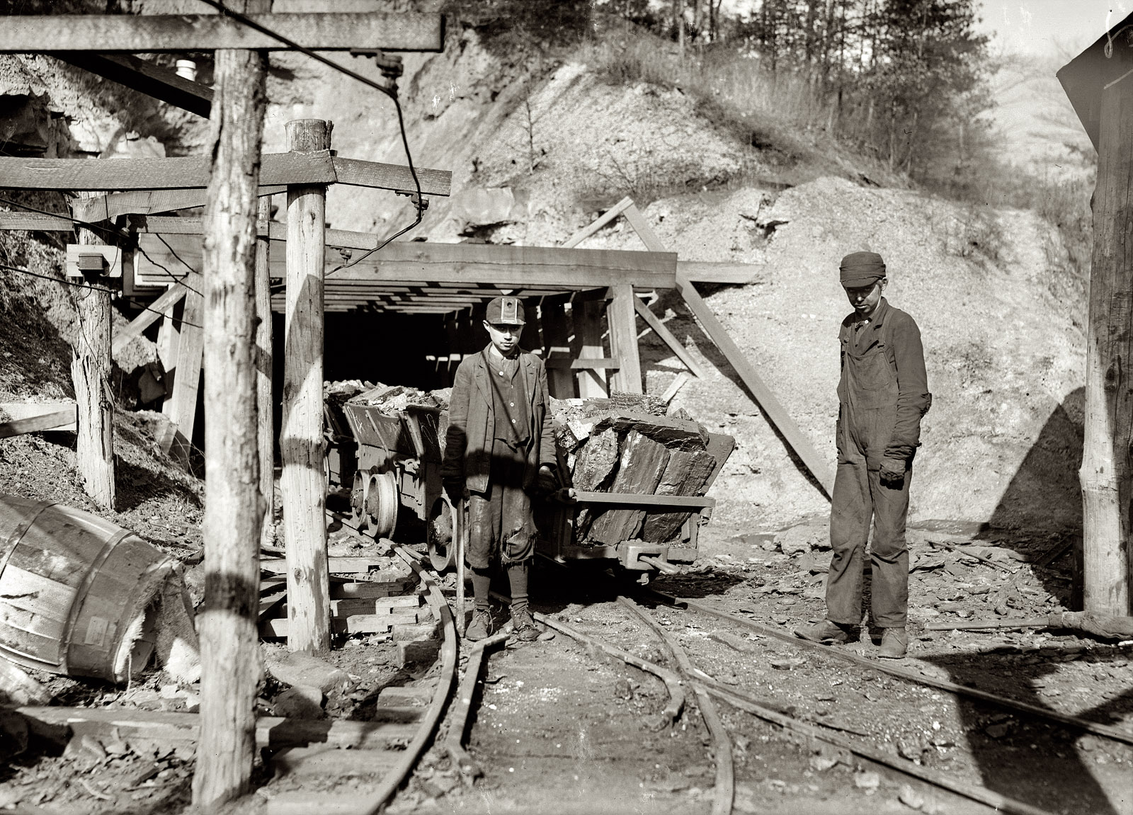 December 1910. Coal Creek, Tennessee. "Hard work and dangerous for such a young boy. James O'Dell, a greaser and coupler on the tipple of the Cross Mountain Mine, Knoxville Iron Co., in the vicinity of Coal Creek. James has been there four months. Helps push these heavily loaded cars. Appears to be about 12 or 13 years old." Photograph and caption by Lewis Wickes Hine. View full size.