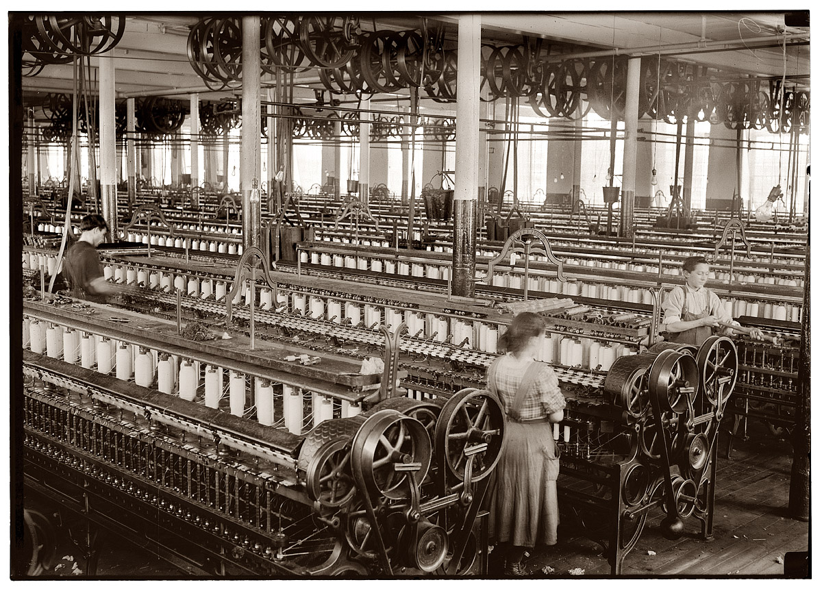 January 1912. "The Flint Cotton Mill spinning room. Small girls are employed here but not in evidence this noon. Fall River, Massachusetts." View full size.