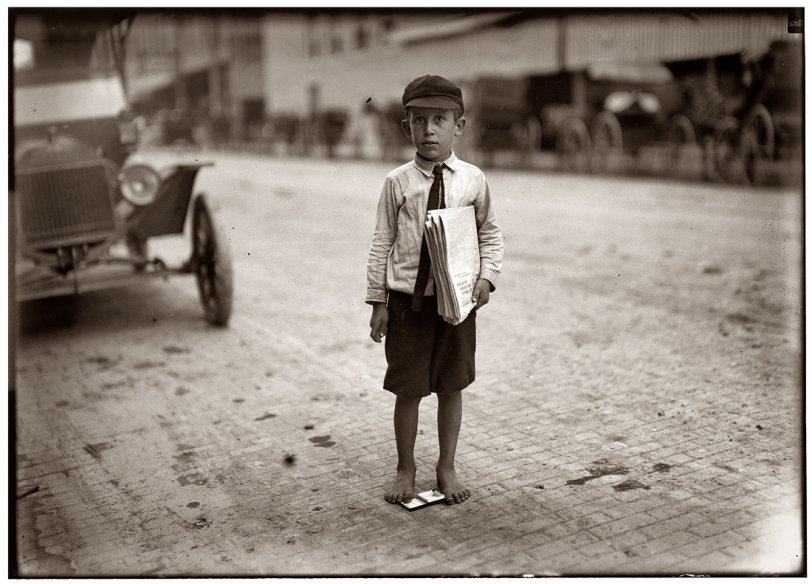 Waco, Texas. September 1913. "Eight-year-old newsie. Many youngsters get up early to sell papers. One 10-year-old starts out at 3 A.M. every day and goes to school."  View full size. Photograph by Lewis Wickes Hine.