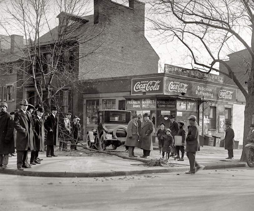 Washington, D.C., 1921. "Accident at 12th and K." (The Franklin Market: "Your cigar and school supply headquarters!") National Photo Co. View full size.
