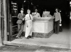 October 1914. "Table boy in a Montgomery. Alabama, drug store. Many of these boys work until midnight, and some are very young." Hey kid -- one peppermint caramel venti latte to go. Photo by Lewis Wickes Hine. View full size.