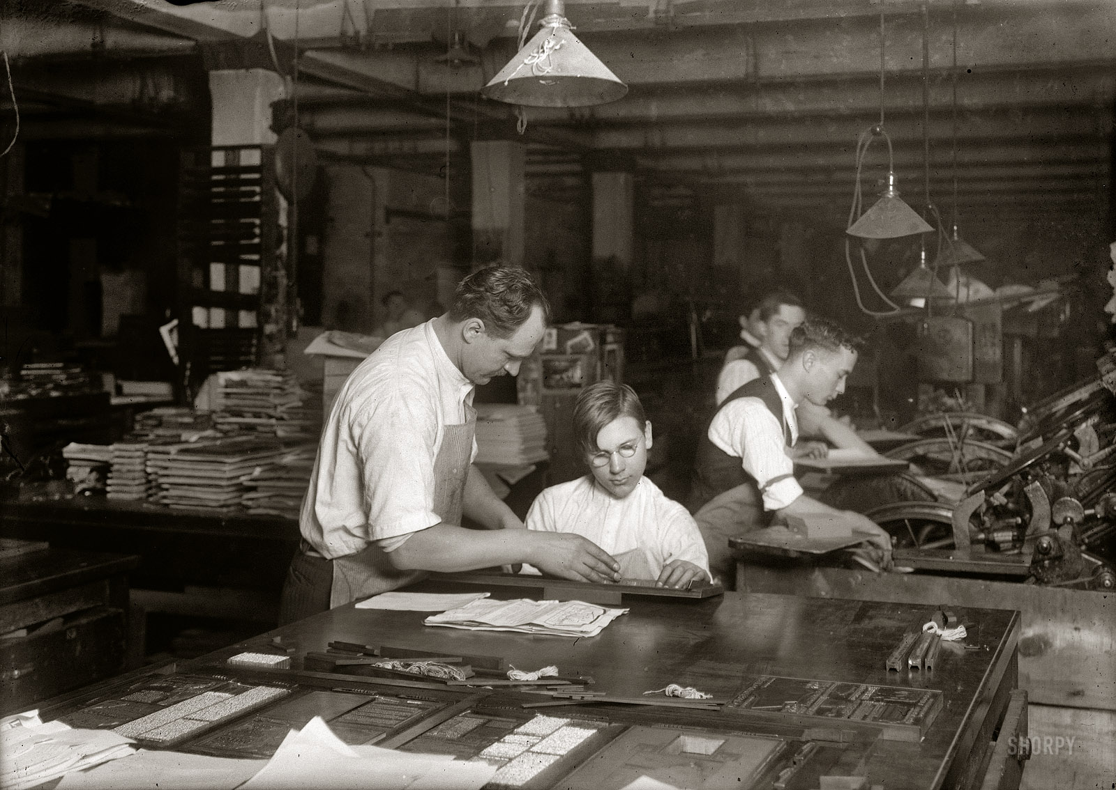 New York, February 1917. "Horace Lindfors, 14-year-old printer's helper, sizing up leads for the Riverside Press, First Avenue." 5x7 inch glass negative. Photograph and caption by Lewis Wickes Hine. View full size.