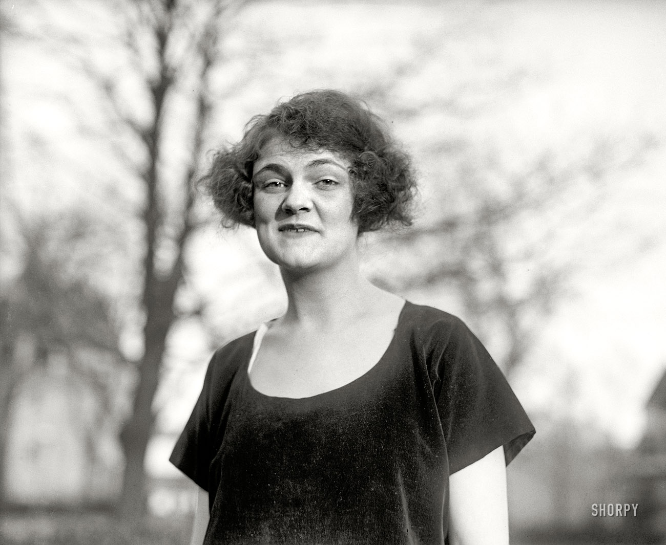 Washington, D.C., 1922. "Unidentified woman." Trying to tell us ... something. National Photo Company Collection glass negative. View full size.