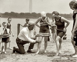 &nbsp; &nbsp; &nbsp; &nbsp; Commemorating the Potomac Thighway Patrol's 100th anniversary, and one of Shorpy's most popular posts --
June 30, 1922. "Washington policeman Bill Norton measuring the distance between knee and suit at the Tidal Basin bathing beach after Col. Sherrill, Superintendent of Public Buildings and Grounds, issued an order that suits not be over six inches above the knee." 4x5 inch glass negative, National Photo Company Collection. View full size.