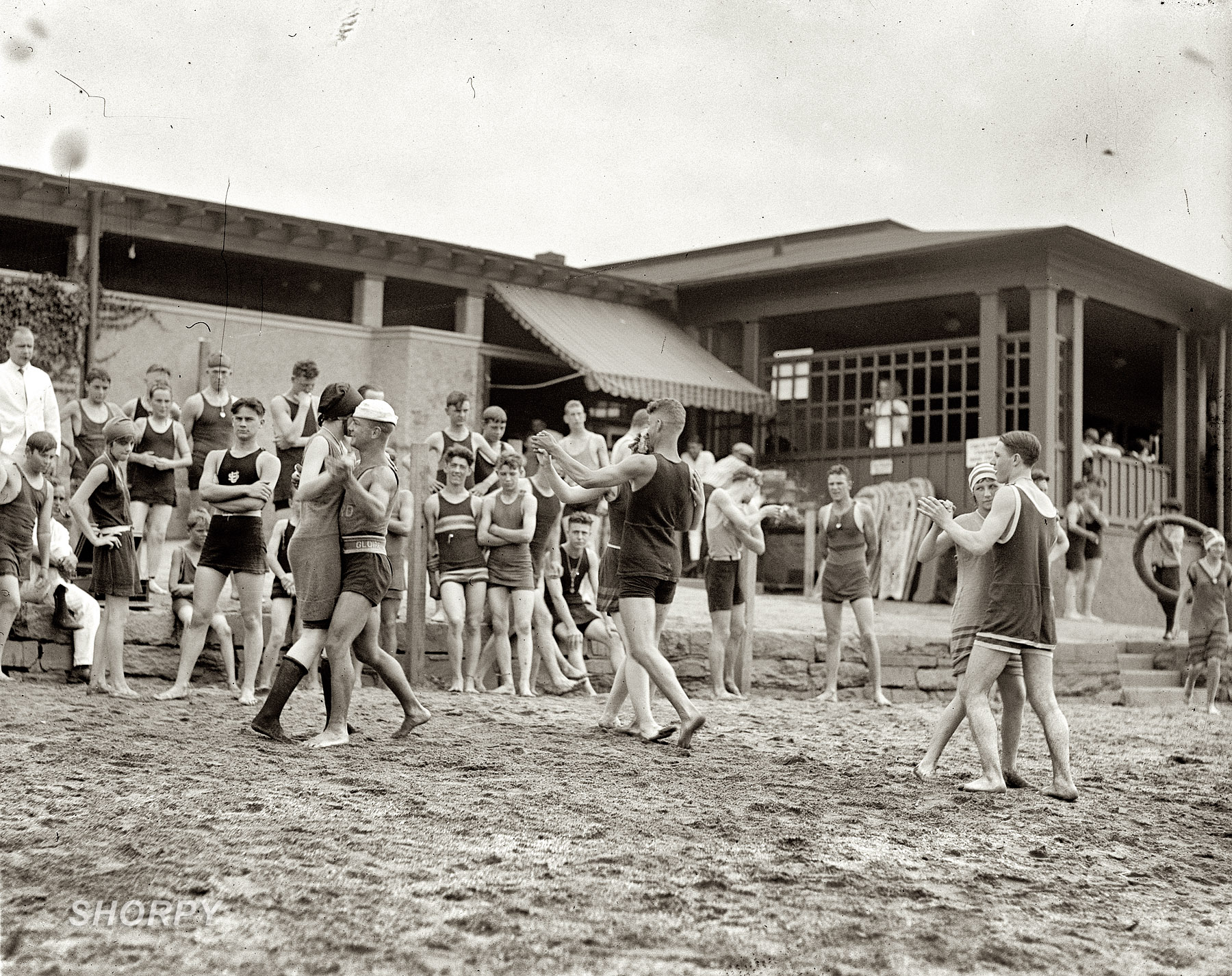 July 6, 1922. "People dancing on beach." Pavilion at the Potomac bathing beach in Washington. View full size. National Photo Company Collection glass negative.