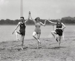 1922. Washington, D.C. The actress Kay Laurell again, five years before her premature curtain, with friends at the Potomac Tidal Basin. View full size.
Give me liberty...or give me....Another Broadway contribution to the war effort was the bust of Miss Kay Laurell. In the Ziegfeld Follies of 1917, a tableau by Ben Ali Hagan had Miss Laurell posed before crossed American and French flags in the fatigue uniform of a French soldier, blouse torn by some previously dispatched vicious German, exposing one reportedly magnificent breast. Word was that the French government ordered 200,000 copies of a photo of Miss Laurell's portrayal to use in an enlistment campaign. There is a suspicion that the word came from Ziegfeld's publicity people however. 
On Kay"Any woman could get money out of a man. What took real skill was getting the money and evading the sleeping." -- Kay Laurell
"She was the most successful practitioner of her trade
of her generation in New York. She had all the arts of a first-rate harlot. The skull and crossbones were there on the label for all to see." -- Helen Hayes
And the URL is?So where's the shot of the reportedly magnificent breast? The February 1973 Playboy claims to feature Kay, among other Siegfeld [sic] Girls.
Oar Guitar GirlKay's friend on the right is the oar guitar girl from the canoe photo. Who was she?
Eleanor Griffith?Perhaps the other lass is Eleanor Griffith, Kay's costar in the production of  "Ladies Night" then playing at the Belasco. The Library of Congress archives contain one labeled photo of Miss Griffith: I think the smile is very similar.


Update: another image of Eleanor, circa 1928:

Magnificently Breastless
This photo via the New York Public Library seems to be her famous costume from the 1918 Ziegfeld Follies. Some prude appears to have engineered a coverup. However those with a purely historic interest in Ms. Laurell's bosom may see it in several works by painter William Glackens, for whom Laurell repeatedly posed.
As You Are I Once WasDancing figures on the beach,
As the marks left by their feet,
Are all long gone.
And rising in far off in the mist,
We behold the obelisk.
The Cigaretteis nice touch on the beach. 
My mother died in 1938 of pneumonia before antibiotics at the age of 36. A death like that now would be very unlikely.
Not exactly &quot;Les Miz&quot;As the war intensified, posing undressed began to be considered patriotic. If a woman stood naked posed as the Statue of Liberty, she was doing her duty for the American troops. Indeed, a record number of woman volunteered to be "undraped" in the 1917 edition's centerpiece. In the Ziegfeld Follies of 1918, which opened after the United States had joined the war, the curtain opened on a darkened stage to reveal a huge revolving globe with Kay Laurell perched on top, breast exposed. Little French girls in rags, a dying soldier attended by Red Cross volunteers, and a trench over which doughboys charged amid devastating gunfire completed the scene. Gazing down on a Ben Ali Haggin set piece designed to look like the world burning, Laurell was supposed to represent the spirit of France.
-- From "Striptease: The Untold History of the Girlie Show" by Rachel Schteir.
A Photo Shoot...Is no reason to interrupt one's smoking.
The Genuine ArticlesI don't know if they are "magnificent," but like they said on Seinfeld:  "they're real, and they're spectacular!"
The Ziegfeld TableauThe tableau described by gblawson is fairly standard French imagery; a depiction of Marianne (the symbol of France) fighting and victorious. This version of Marianne is inevitably depicted wearing a Phrygian cap (in Roman times indicating a freed slave) and one breast bared, recalling the goddess Athena. Probably the most famous depiction is Delacroix's 1830 painting "Liberty Leading the People."
How it might have looked in colorCouldn't resist. Click to enlarge.

Kay LaurellKay Laurell did not die from pneumonia. She died in childbirth.
Wikepedia is not correct. She had a son, don't know what happened to him, he was to inherit her estate. Read the newspaper article.
re: Kay LaurellIMDB and Wikipedia both claim pneumonia as cause of death since that is what was reported in the New York Times obituary. A story in a 1930 edition of the Miami News does however reinforce the contention that it was death by childbirth.
(The Gallery, D.C., Natl Photo, Swimming)