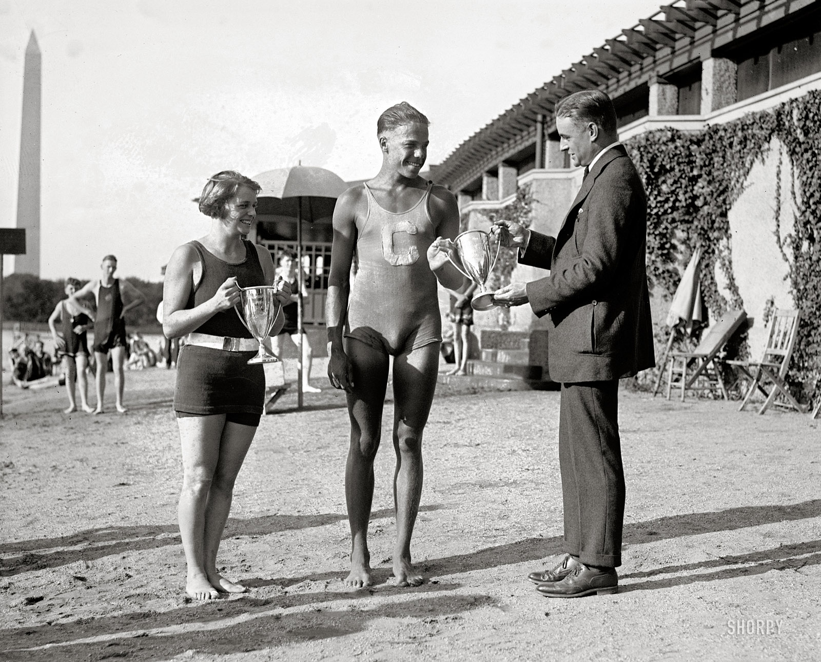 August 15, 1922. Washington, D.C. "Florence Skadding and Mark Coles." At the Tidal Basin bathing pavilion. National Photo glass negative. View full size.