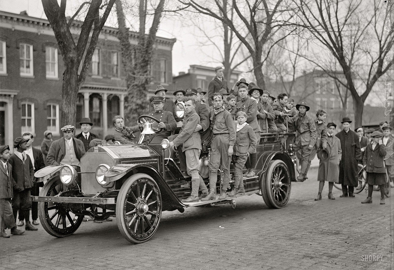 Washington, D.C., circa 1916. "Boy Scouts fire drill." Hey Chief, can I ring the bell? Harris & Ewing Collection glass negative. View full size.