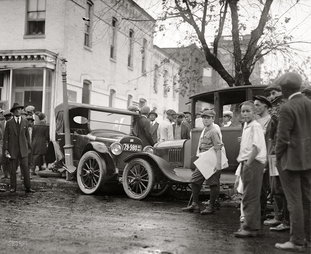 October 7, 1922. Washington, D.C.  "Auto accident, 13th and S." If you don't like my driving, get off the sidewalk! National Photo glass negative. View full size.