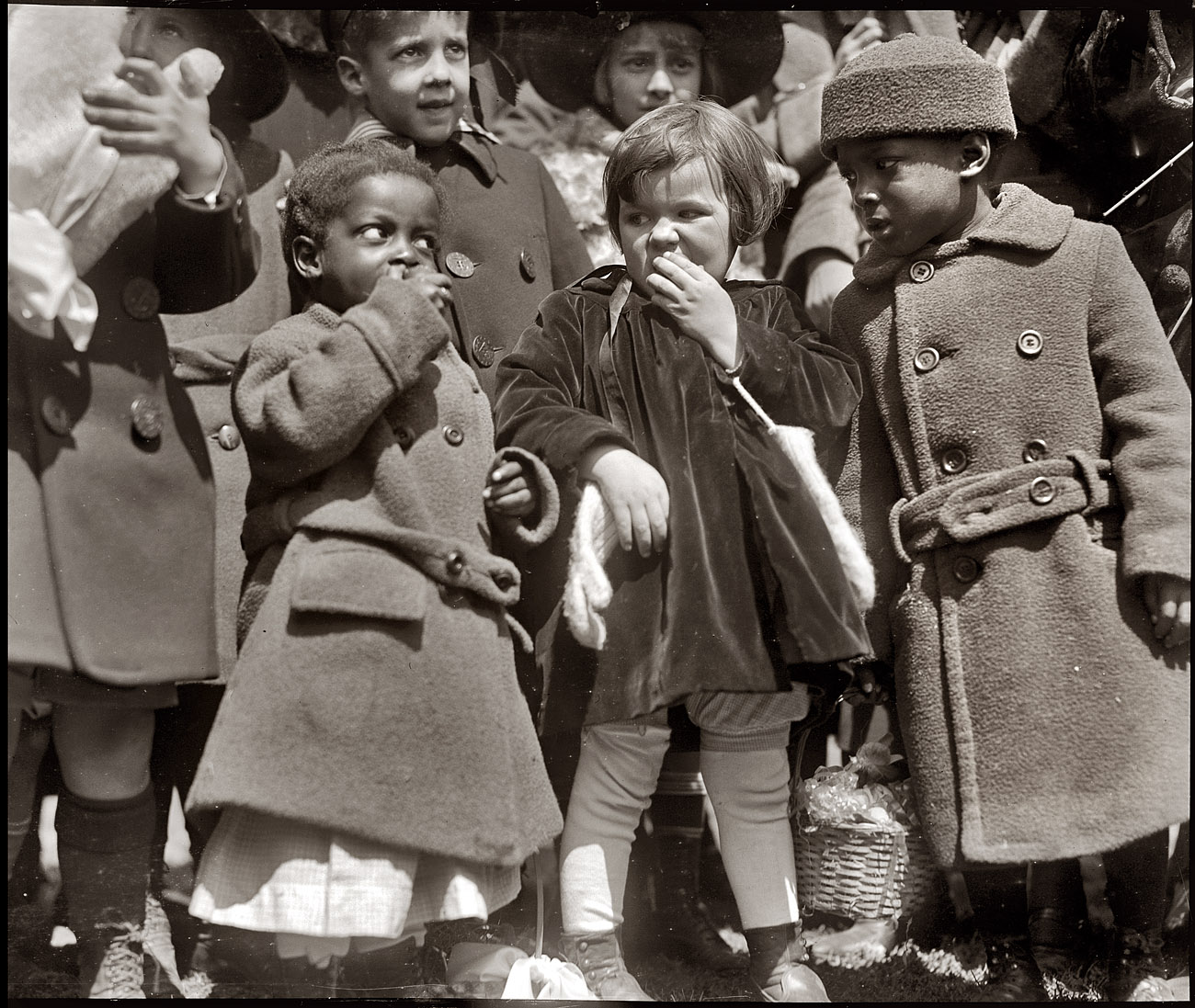 April 2, 1923. Children eating at the White House Easter egg roll in Washington. View full size. 4x5 glass negative, National Photo Company Collection.