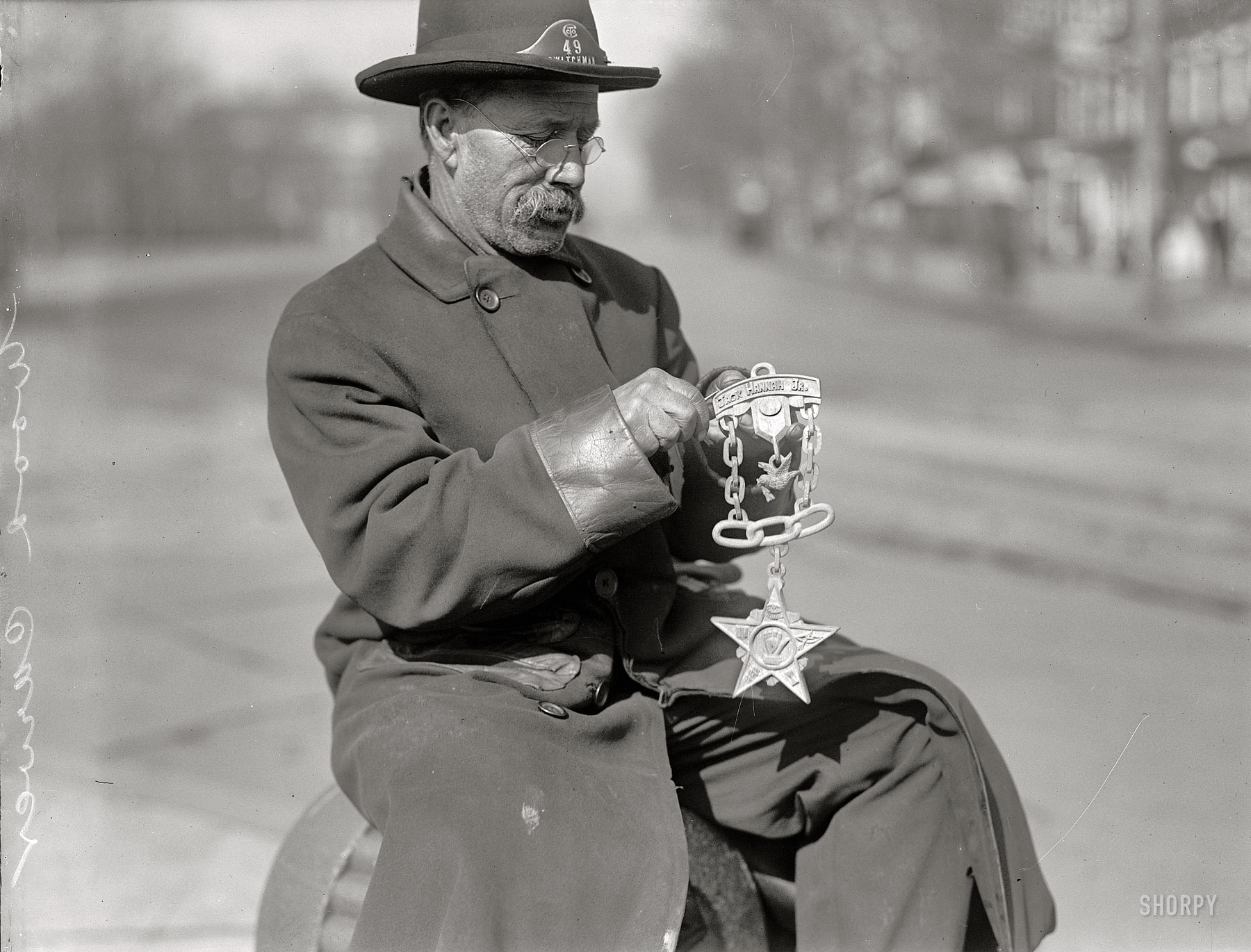 Washington, D.C., 1917. "Grand Army of the Republic. Emblem carved in wood by switchman at peace monument." The G.A.R. was a fraternal organization whose members were Union Army veterans. Harris & Ewing. View full size.