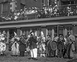 A clown band plays at a children's hospital in the Washington, D.C. area on May 1, 1923. From the National Photo Company collection. View full size.