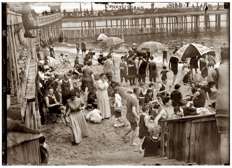 On the beach at New York's Coney Island circa 1910-1915. View full size. 5x7 glass negative, George Grantham Bain Collection.
