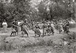 Washington, D.C., or vicinity circa 1917. "Girl Scouts. Activities and play." Harris & Ewing Collection glass negative. View full size.