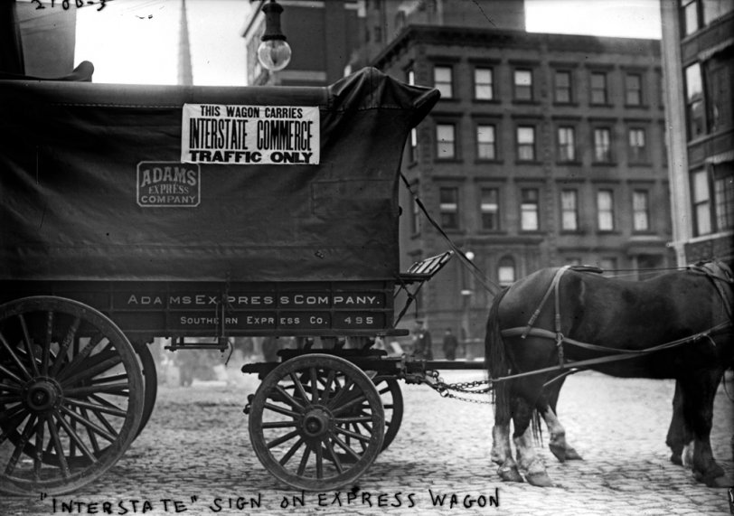 An express wagon for "Interstate Commerce" stands ready in New York City. From the George Grantham Bain collection. November 1910. View full size.