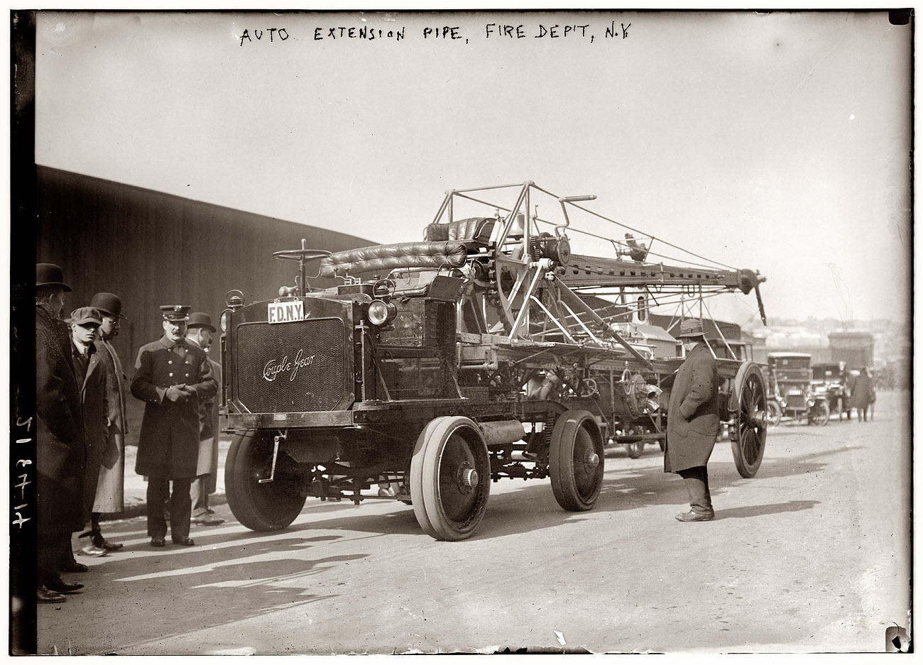 New York Fire Department "auto extension pipe" hose truck (?) circa 1913. "Couple Gear" on radiator. View full size. George Grantham Bain Collection.