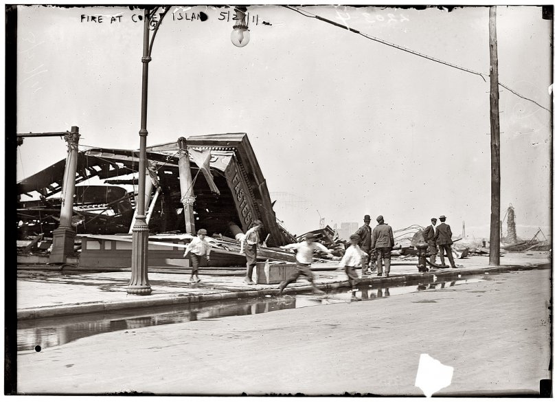 May 27, 1911. Aftermath of the Dreamland amusement park fire at Coney Island. View full size. George Grantham Bain Collection. Note the ancient streetlamp.

