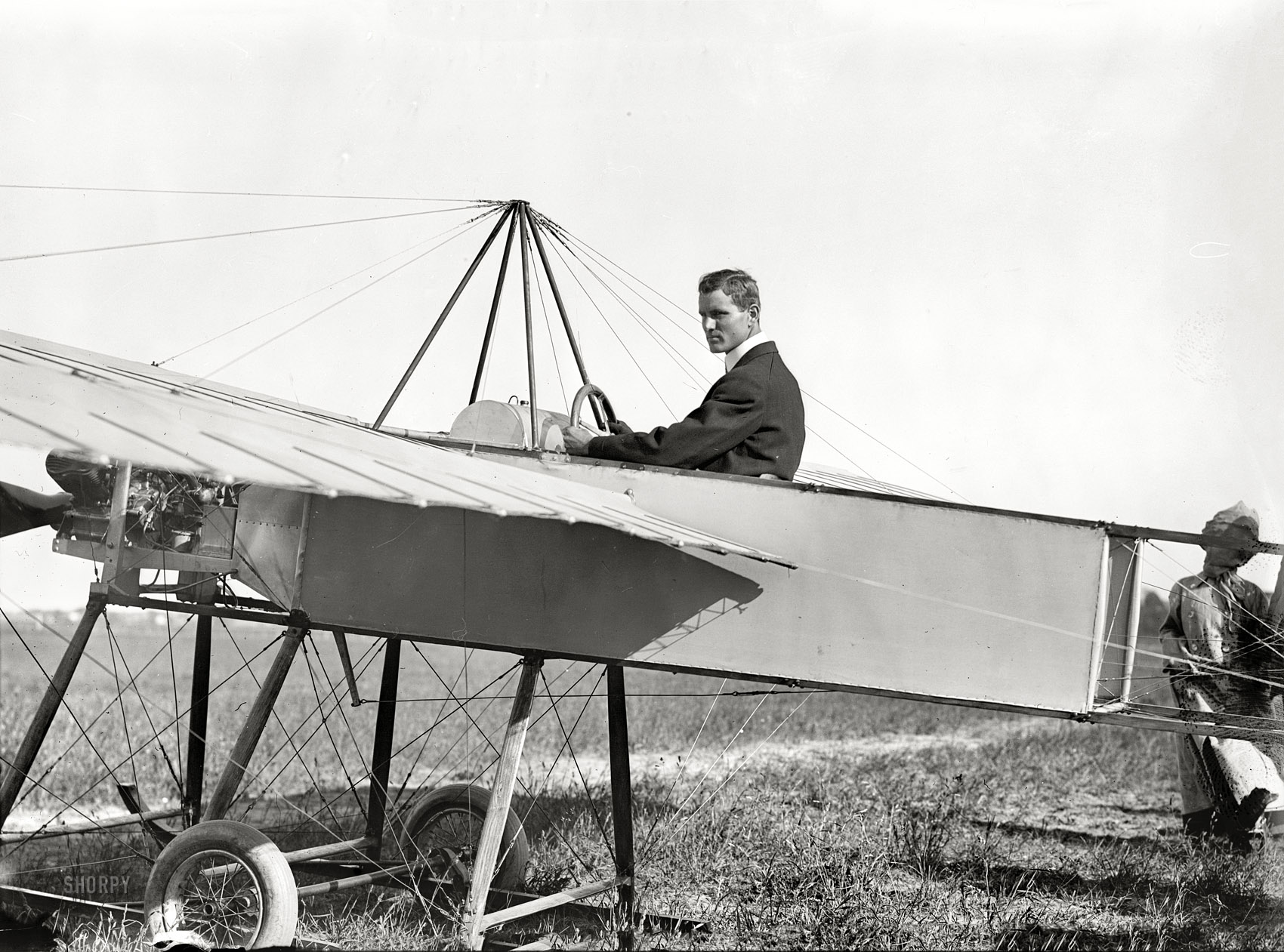 New York or vicinity circa 1910. "J.M. Johnson in Bleriotype." The aviator: dashing. His attire: natty. Bain News Service glass negative. View full size.
