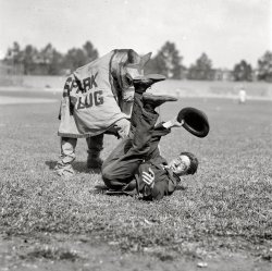 September 3, 1923. "Police and Firemen's ballgame." At Griffith Stadium in Washington, D.C., Barney and Spark Plug from the popular comic strip "Barney Google." National Photo Company Collection glass negative. View full size.
Cue Snuffy Smith11 years later Barney and the horse go to North Carolina mountains and meet moonshiner Snuffy Smith.
And thanks to this post and title, I now know who introduced the phrase "Horsefeathers."
Good Afternoon for CrimeWashington Post Sep 3, 1923 


Police and Fireman in Big Clash Today

If you are intent upon committing a crime, this afternoon would be a fine time for it as most of the District cops and firefighters will be at the American League park, either participating in the game between the teams representing services, or rooting for their nine to win.
This will is one of the few occasions where fans will get a real run for their money at a benefit game. The cash taken in a today's clash will go to the relief funds of the two organizations, which is one reason why fans should attend, while the other is that a cracking good game should result.
Both teams have been playing all season and the rivalry between them is intense.  For five years, the Police team has come out on top, due largely to the good pitching of Finney Kelly.  He will pitch again today, but the Hook and Ladder boys claim that in Carroll Hull they have his equal and that they are just simply bound to break into the winning column this time.  Close to 20,000 fans are expected to be on hand to see whether they are right or not.

(The Gallery, D.C., Natl Photo, Sports)
