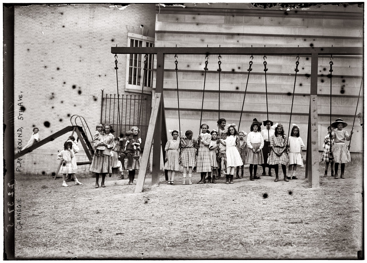 Carnegie Playground, Fifth Avenue, New York. Circa 1910. View full size. 5x7 glass negative, George Grantham Bain Collection, Library of Congress.