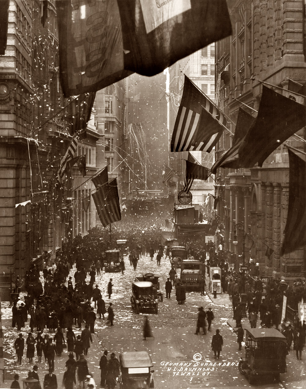 Celebration on Wall Street upon the news of Germany's surrender in World War I. November 1918. View full size. Photograph by W.L. Drummond.