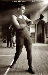 November 13, 1911. New York City. Our third shot of the heavyweight fighter Carl Morris. Glass negative, George Grantham Bain Collection. View full size.