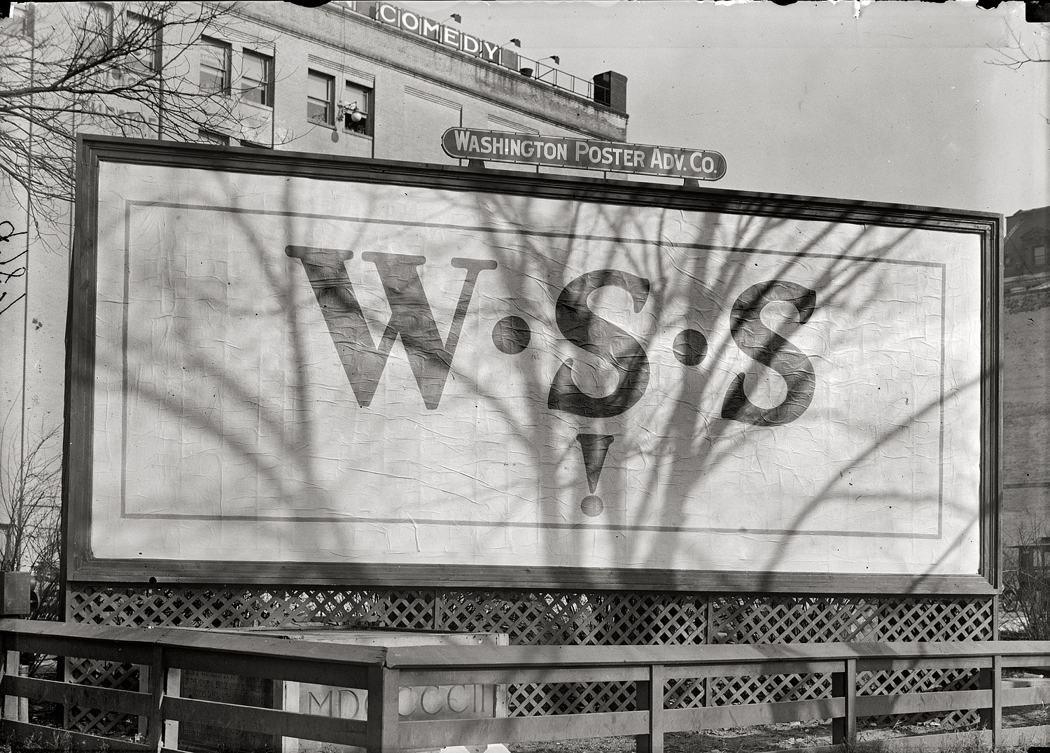 Washington , D.C., circa 1917. "W.S.S. poster." (Aha. So that's what it is!) Harris & Ewing Collection glass negative, Library of Congress. View full size.