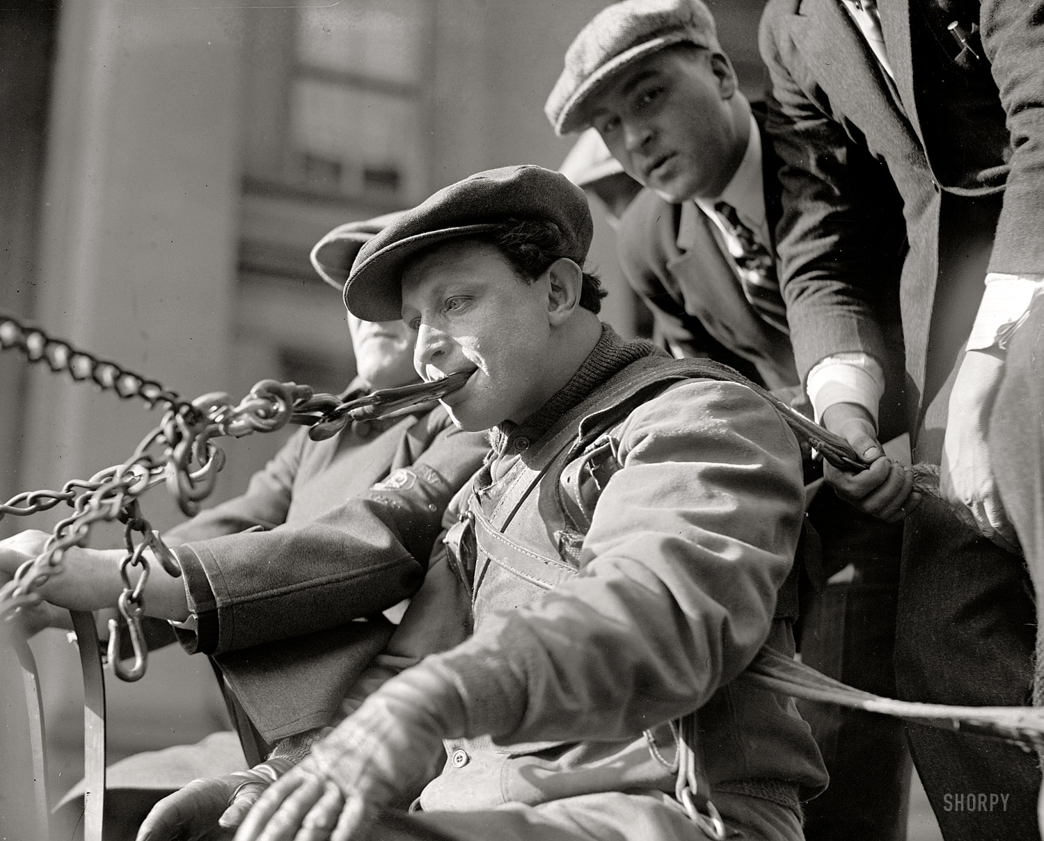 "Untitled -- November 27, 1923." Who can figure out what's going on here? National Photo Company Collection glass negative. View full size.
Update: Stanton Square rides to the rescue with the answer: It's the vaudeville strongman Zishe Breitbart, who was something of a legend in his own time.