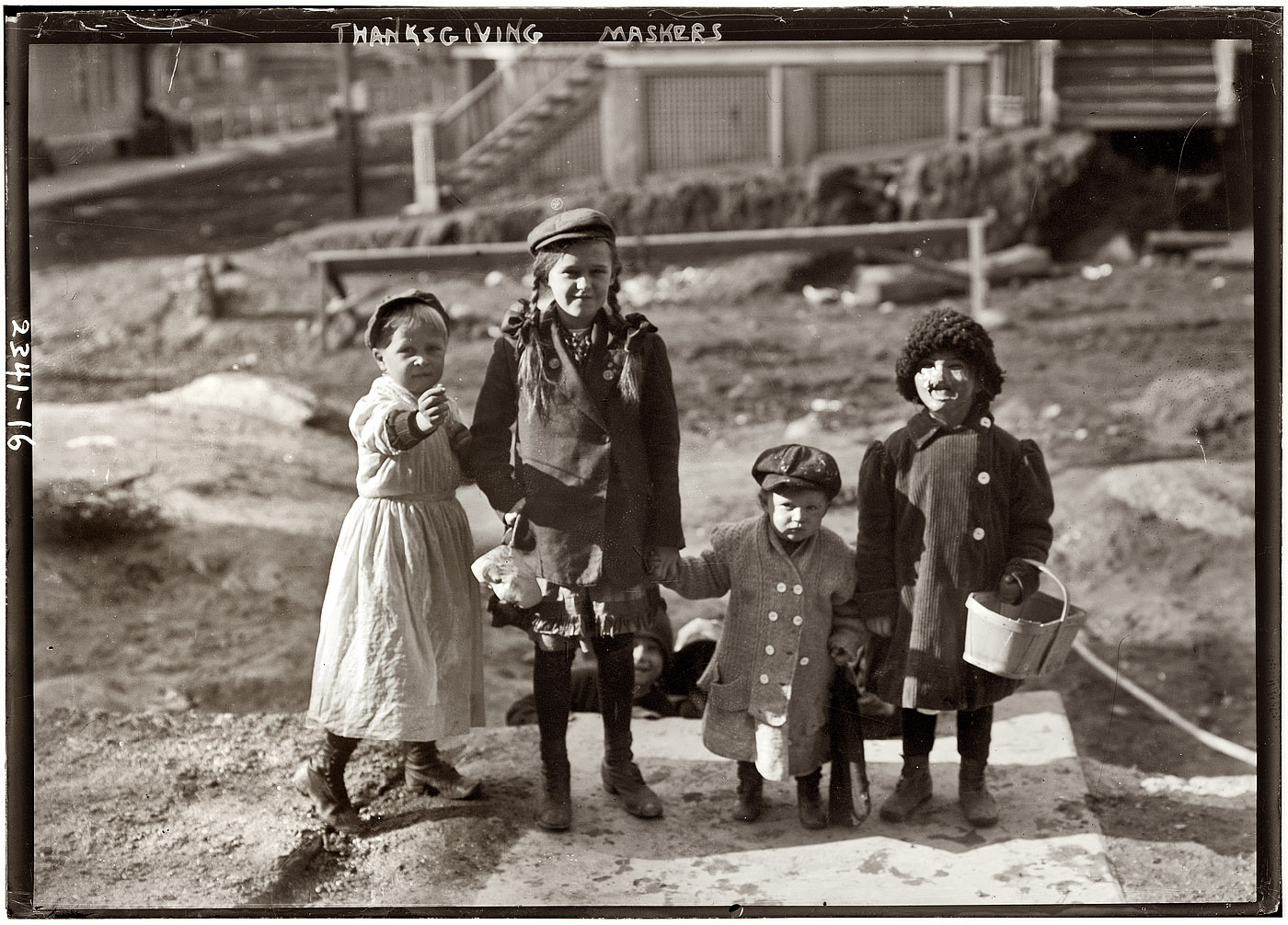 November 1911. Before Halloween came into its own as a holiday in this country, there was "Thanksgiving masking," where kids would dress up and go door to door for apples, or maybe "scramble for pennies." View full size. 5x7 glass negative, George Grantham Bain Collection. Links: Yahoo Xtra | Encyclopedia.com