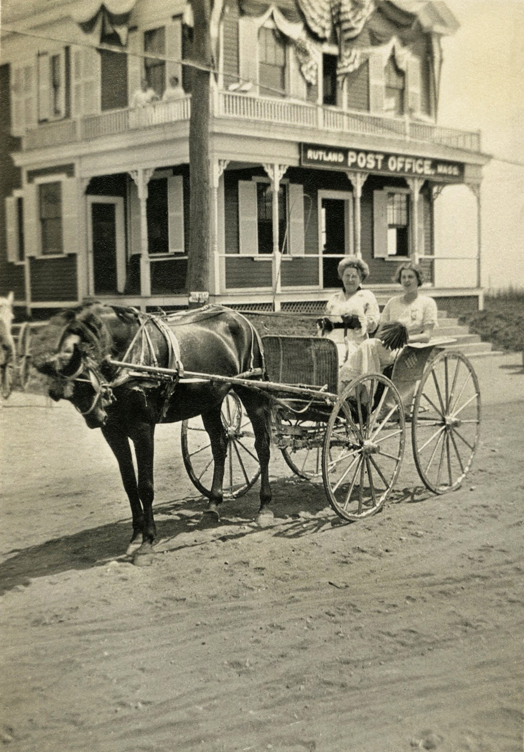 Two of my ancestors in a carriage outside of a post office in Rutland, Massachusetts in 1914. View full size.