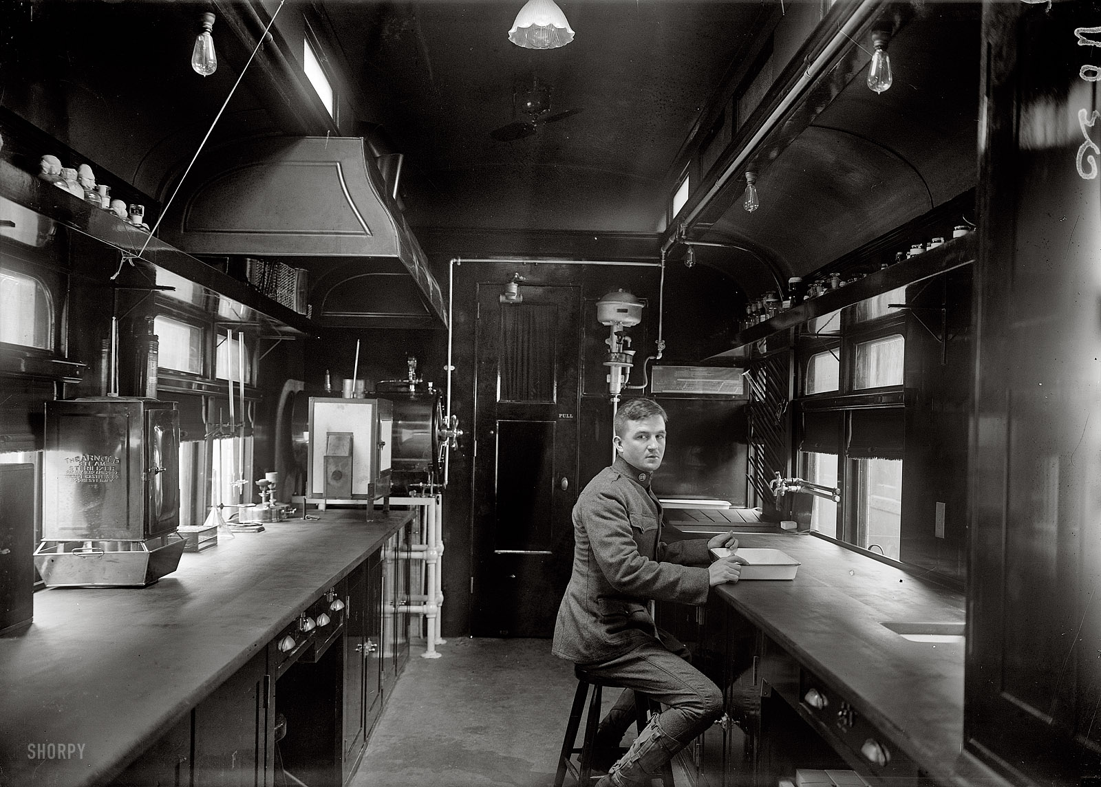 1917. "American Red Cross sanitary railroad car." The "sanitary trains" of World War I played a major role in the delivery of relief supplies and medical care to Allied prisoners in Europe, as well as their repatriation after the Armistice. Harris & Ewing Collection glass negative, Library of Congress. View full size.